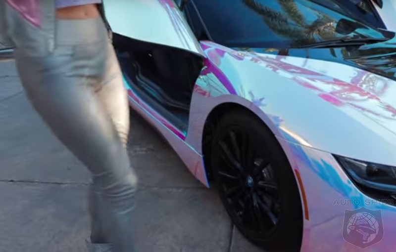 REALLY? Paris Hilton Matches Her $165,000 BMW i8 To Her New Holographic Outfit